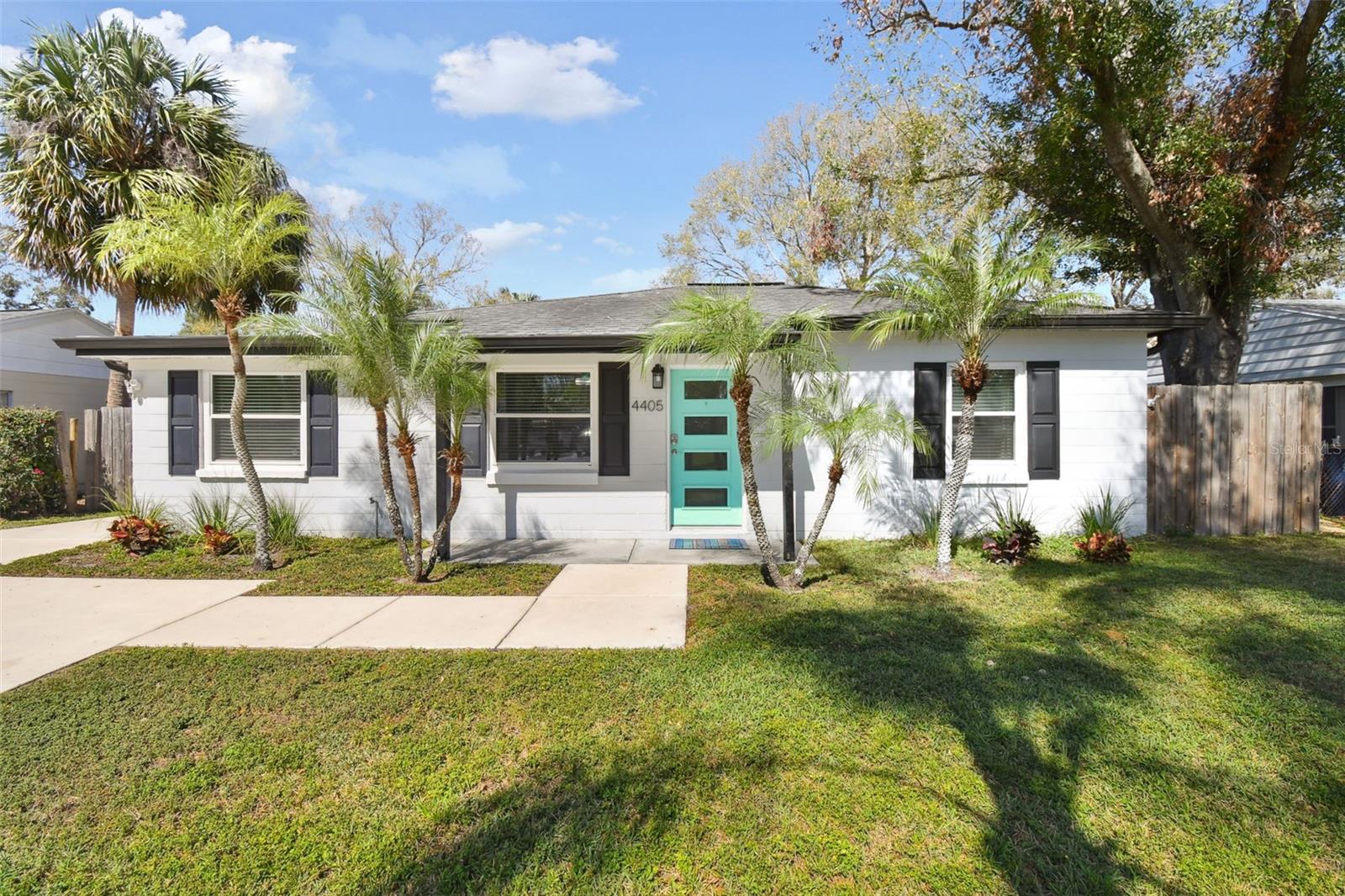 This beautifully updated, TURN KEY home in South Tampa stayed HIGH AND DRY during last year's storms and is move-in ready. Completely rehabbed and with recent updates, including fresh exterior paint and a new deck in 2023, a new driveway, full INTERIOR Painting 2025, you'll also have peace of mind with this ALL BLOCK CONSTRUCTION and IMPACT RESISTANT WINDOWS. The kitchen is modern with granite countertops and stainless-steel appliances, while the bathroom has also been fully updated. NO CARPET, wood look tile flooring throughout, making for easy maintenance. The living room is bright and open, and there's also a separate den/dining area. For added convenience and storage space, the home includes an indoor utility room with WASHER AND DRYER.
The oversized, spacious, and FENCED backyard has a fire pit and no backyard neighbors, offering privacy and space for outdoor relaxation. There’s plenty of room for a boat or RV with double gate access, and TWO large detached sheds provide additional storage.
Located on a quiet, no-through street, this home is just minutes from all the shopping, dining, and parks South Tampa has to offer. It's a perfect blend of comfort, convenience, and peace of mind.