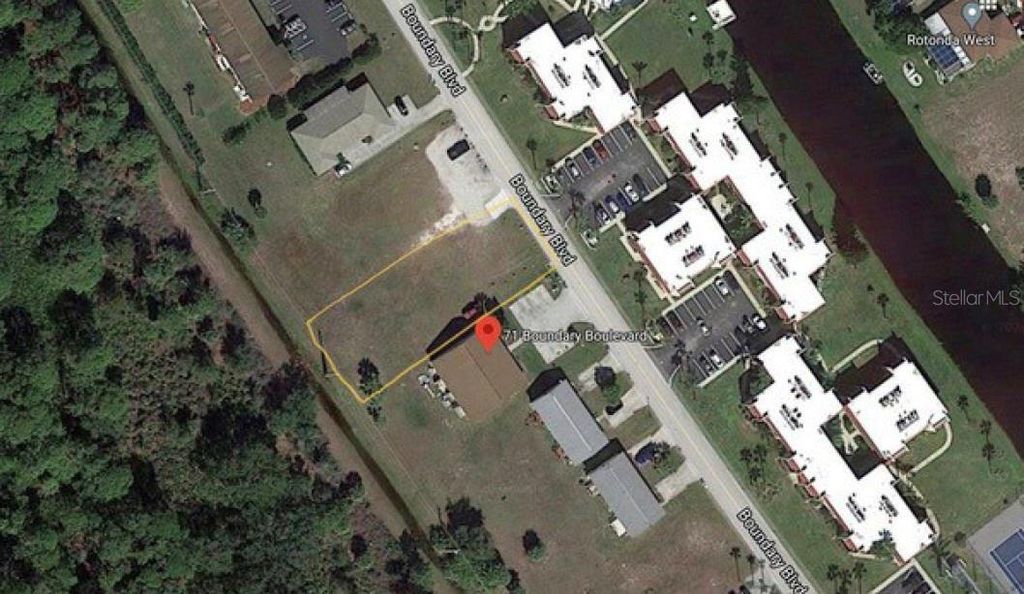 Photo of 71 Boundary Boulevard, Rotonda West, FL 33947 (MLS # O6383233)