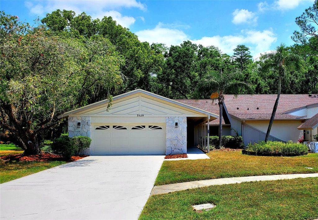 Photo of 3529 Tanglewood Trail, Palm Harbor, FL 34685 (MLS # TB8381178)