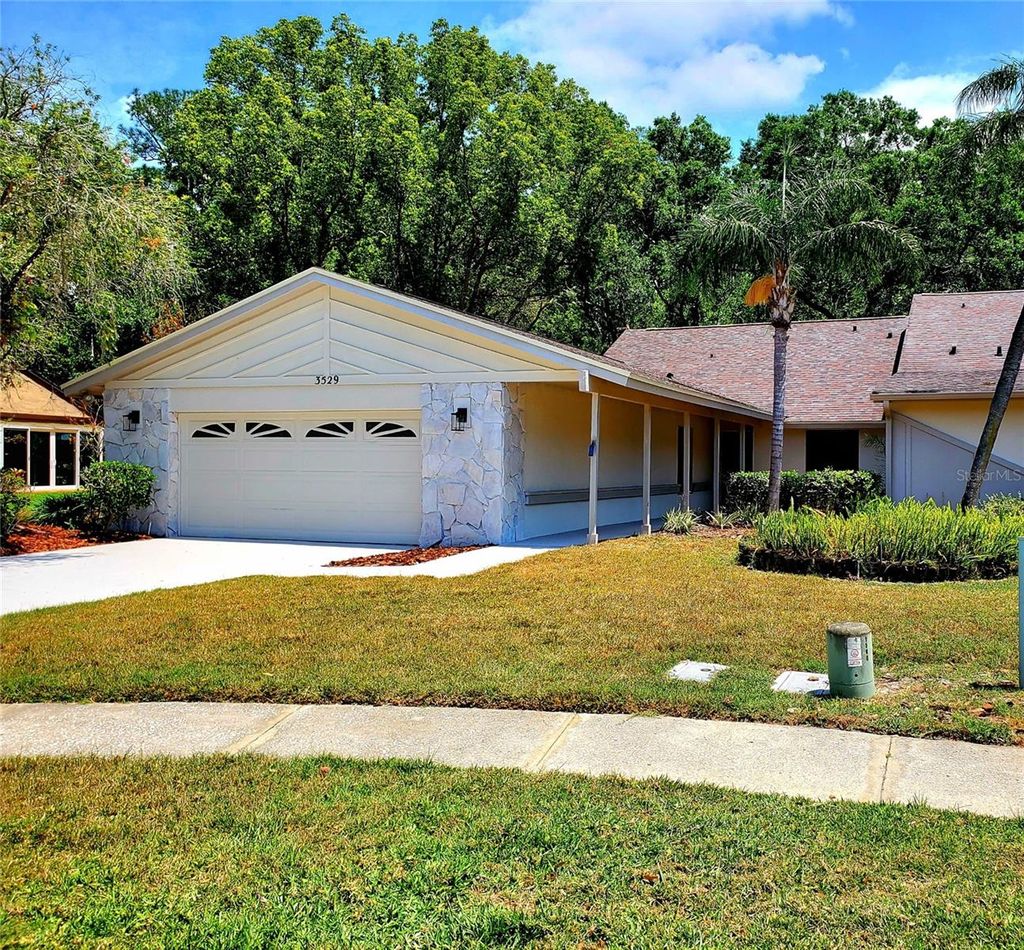 Photo of 3529 Tanglewood Trail, Palm Harbor, FL 34685 (MLS # TB8381178)