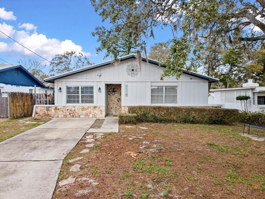 Welcome to 2113 W Perio Street, a delightful single-family home in the established Forest Hills neighborhood of Tampa. This solidly built residence offers 3 bedrooms and 2 full bathrooms with a den in a spacious 1,642 sq ft floor plan — perfect for both everyday living and entertaining.

As you step inside, you’ll appreciate the thoughtful layout and comfortable living spaces filled with natural light. The home features a well-appointed kitchen with functional stainless steel appliances, generous dining areas, and plenty of storage giving you room to grow. In the rear of the home you will be met with the well sized primary suite and updated primary bathroom. Along with two generously sized bedrooms and another updated second bathroom- this home brings value and elegance.

Outside, enjoy a charming yard with mature landscaping and a covered porch — great for relaxing or hosting gatherings. One of the highlights of this location is being directly across the street from a neighborhood park, making it easy to enjoy outdoor activities, morning walks, or playtime without leaving your block. Not to forget the Babe Zharias golf course, you'll be able to play 18 holes in under a few minute drive away!

This home provides it all, comfort, space, and lifestyle- don't let this opportunity pass. Schedule your private showing today!