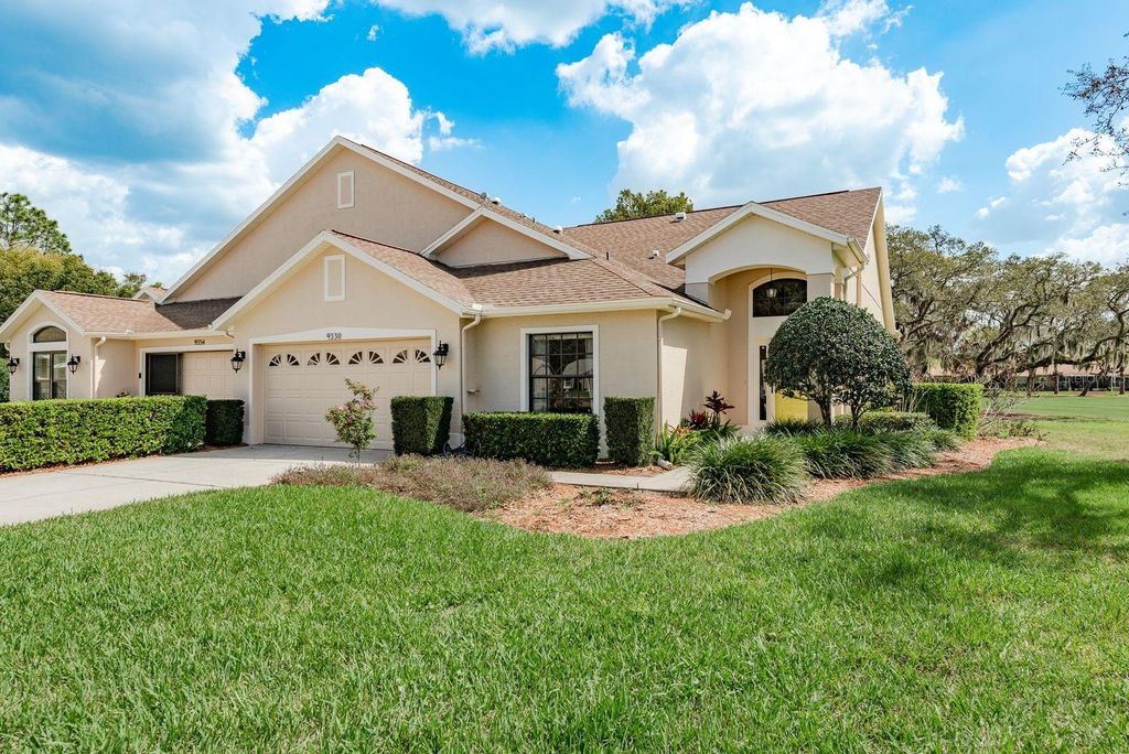 Photo of 9330 Whispering Meadow Court, New Port Richey, FL 34655 (MLS # TB8485959)