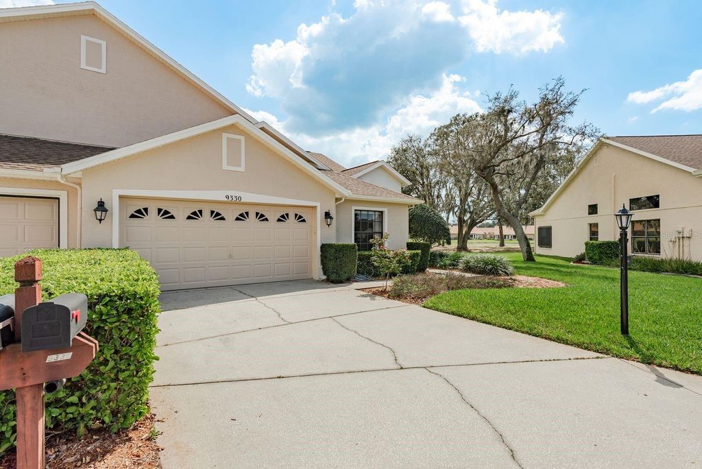 Photo of 9330 Whispering Meadow Court, New Port Richey, FL 34655 (MLS # TB8485959)