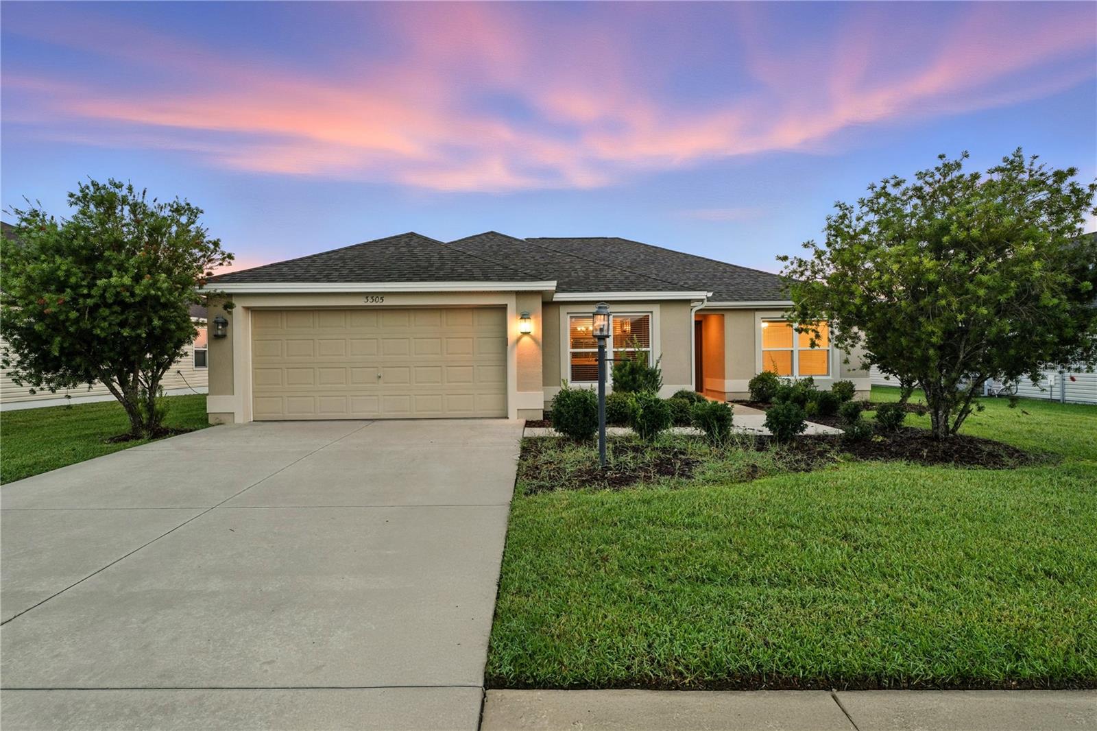 You are going to love the simplified living that awaits you with this not too big, not too small single level living abode. The screened in lanai out back is very private with no rear neighbors is a hit with this "Jasmine" model. It will allow you to enjoy bug free your pets &/or family frolic about in your tabletop flat back yard. The property is SUPER clean & well maintained from the durable LVP flooring to the rich espresso cabinets to the stainless appliances. The community has SO much to offer you will LOVE such as a playground, pool, pickleball courts, tennis, basketball, outdoor gym to name a few. Heck, this is making me want to live there! ;-) The neighborhood is close to everything one may need such as medical, dining, entertainment, major highways, shopping & more! Make 3305 Dzuro Drive yours TODAY!