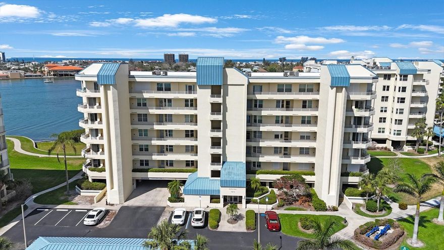 Welcome to BayWatch at Harbourside!  This unique 1990 SqFt Penthouse is one of only 10 located on the Island. Unbelievable water views from both bedrooms and den with an open floor plan allowing water views from the kitchen, living room and dining room. There are 2 bedrooms, 2 baths and a den which could serve as an office, media room or 3rd bedroom.  The unit is move in ready and comes furnished. Upgrades include beautiful tiled flooring throughout with carpet in den and both bedrooms. Kitchen has an island with drawers and cabinets, 2 pantries, reverse osmosis, plenty of cabinets, multiple closets, wall oven/microwave and eat in space. There is a full-size side by side washer/dryer in laundry room located off the kitchen with storage. The dining room has custom designed cabinets with granite countertop, snack bar and double sliders leading to the balcony.  The Living room is separate from dining with another double slider.  Primary bedroom has 2 Walkin California closets and a 3rd wall closet in the dressing area. The bathroom has a water closet, 2 vanities, soaking tub with a separate walk-in shower. Guest room has a large double window with Bay View and huge double closet. There is a tankless water heater and 2 AC units,(2022) for the main and a pancake unit in Primary to cool both bedrooms, age unknown.
The HOA is 987.36 which includes water, sewer, garbage, security, cable, wi-fi, internet, flood and bldg insurance.  $159.00 of the 987.36 goes to the master association that covers public areas. Another feature exclusive to Penthouse living is 2 assigned parking spaces, one carport #118 and one under the bldg.#98.  Storage unit includes one large unit on 6th floor near elevator
When Constructing Harbourside, JMC, the contractor used Solid Steel reinforced concrete construction rather than concrete blocks. Amenities include 6 swimming pools, 5 tennis courts with 2 Pickle ball courts, 2 fitness centers, Jacuzzi, saunas, shuffleboard, 3 outdoor grills, 3 car wash station with vacuum & air, Electric Car Charging stations, Marina with 3 docks and 87 deeded slips. There is no deeded slip to this unit but there are slips available to rent or purchase from other owners. Harbourside’s, Clubhouse has a full social agenda, card room, billiard room, library, woodwork shop and a Grand room with kitchen, great when catering events. Enjoy the 1.5 mile walking trail around the island, which allows you to watch the dolphins, manatees and sea birds or walk your pet. BayWatch allows owners one pet 20 pounds or under per unit and rentals no less then 3 months. Come see and experience Resort style living at its best. Add this unit to your Wishlist, make an appointment to visit our piece of Paradise.