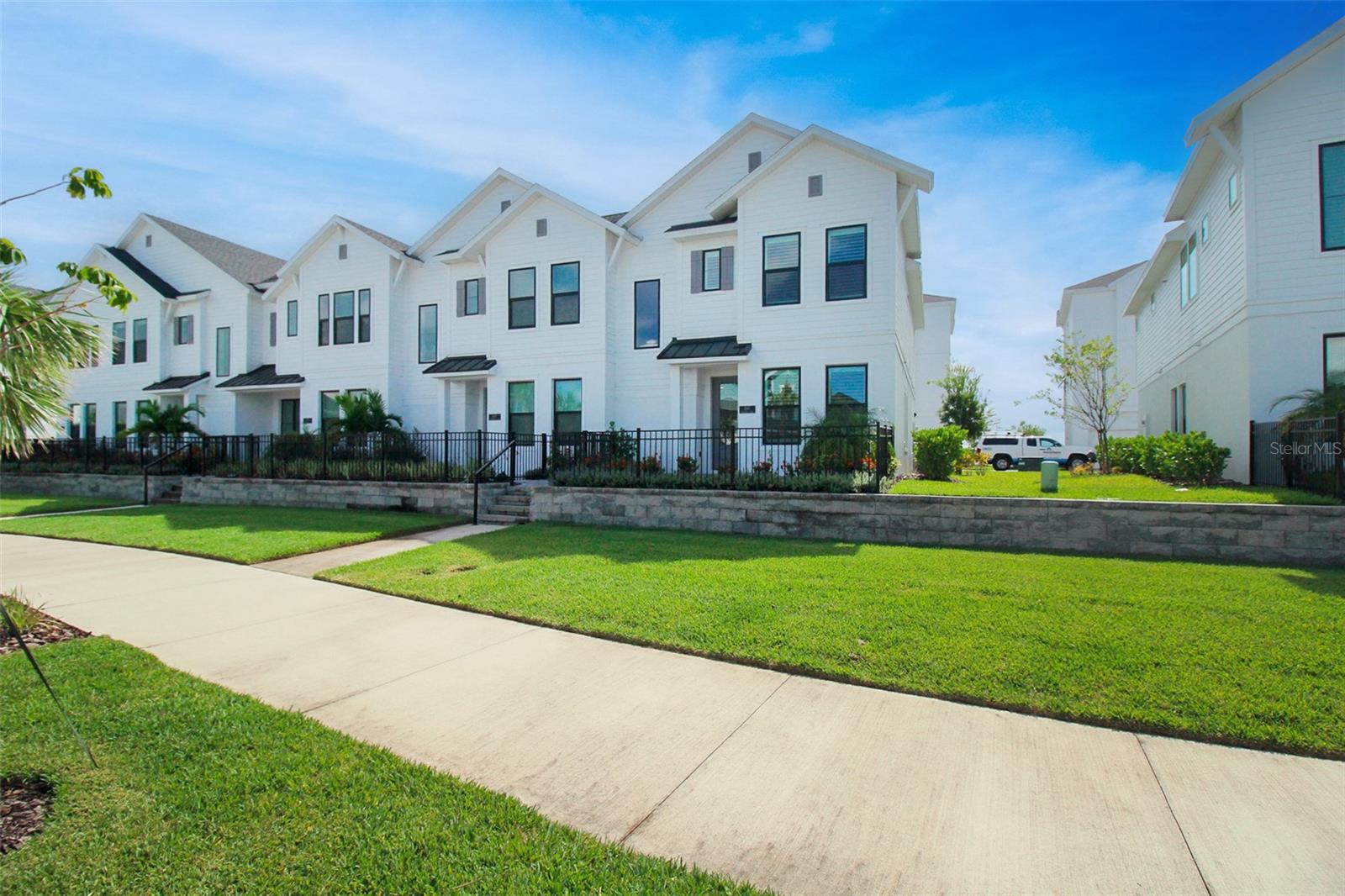 Annual Rental. Welcome to this beautifully constructed 2-story David Weekley townhome at the highly desirable Emerald Landing at Waterside at Lakewood Ranch. This is an end-unit offering extra privacy, added space, and an abundance of natural light throughout. This home blends comfort, style, and functionality. Offering 3 spacious bedrooms upstairs and a bright, open concept living space on the first floor, this home is perfect for modern living. The main level features a well-appointed kitchen with ample cabinet space, a cozy dining area, and a generous living room—ideal for entertaining or relaxing. Upstairs, all three bedrooms provide privacy and comfort, including a primary suite with ample closet space and an en-suite bath with a Super Shower. The home is fully equipped with a state-of-the-art water filtration and softening system with regular service at the owner’s expense. Enjoy the convenience of an oversized 2-car attached garage with an epoxy coated floor, in-unit laundry, and maintenance free living with landscaping and trash collection fees included in the rental rate. This home is conveniently located just a short distance to the community pool and Waterside Place where you will enjoy plenty of shopping and dining options. Emerald Landing is a very amenity rich community with a resort-style pool that includes lap lanes, pergolas and cabanas, two pickleball courts, fire pit, walking trails and scenic views of Lake King Fisher. Close proximity for I-75, UTC, Sarasota International Airport, ODA (Out of Door Academy), Cardinal Mooney High School and Downtown Sarasota. This townhome has everything you need to feel right at home. In addition to the monthly rent, a $35 Resident Benefit Fee will be applied. No Pets Please.
