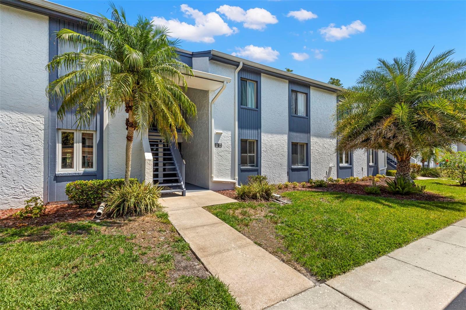 Check out this adorable 2 bed/2 bath 1st floor unit located within the highly sought after community of East Lake Woodlands. This home offers an open floor plan. Take in the views of the conservation the moment you step inside. The family room/dining room combo has luxury vinyl and a candle chandelier with sconces. The kitchen is open to the family room and has a great island bar that works well for entertaining, also features granite countertops and comes with Stainless Steel appliances, double sink and pantry closet and a small area that could hold a small cafe table. The primary bedroom has 2 walk in closets and extra storage space for towels and linens and an updated bathroom with square sink, granite countertops, mirror and Hollywood lighting. The split plan offers the primary in the back of the home and the secondary bedroom in the front offering a wall of closets with the second bathroom across the hall and featuring a cultured marble sink top, wood cabinetry and shower/tub combo. Enjoy a morning cup of coffee and relax on the exterior screened in patio with a view of the lush landscape! You also have an open patio great for soaking in the sun. Enjoy the East Lake Woodlands community offering a great central location, close to shopping, dining, recreation, a golf course, gated community with pool and a club house that is available to join. Rent Includes: Basic cable TV, Pest Control, Sewer and Water