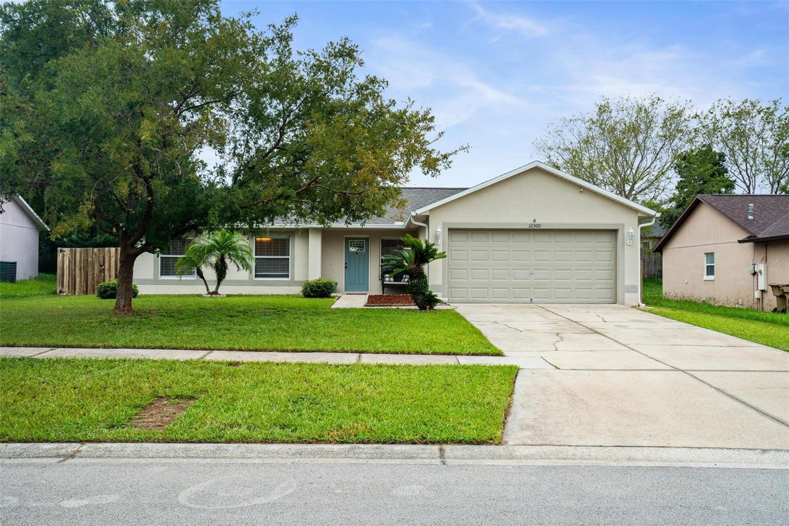 Conveniently located and move-in ready, this updated 3-bedroom, 2-bathroom home combines comfort, style, and functionality. Inside, you’ll find luxury vinyl plank flooring throughout and a desirable split floor plan that offers privacy for all. High ceilings and an open-concept layout create a spacious feel, while a dedicated dining area provides flexibility for seating or a potential home office. The kitchen serves as the heart of the home, featuring shaker-style cabinetry, faux-marble countertops, a large farmhouse sink, and ample storage. Thoughtful upgrades maximize every inch of space. Outside, the fully fenced backyard is ideal for pets, play, or gardening. Nestled in the established Spring Valley community of Clermont, you’ll enjoy easy access to shopping, dining, medical offices, and entertainment with low HOA fees and no CDD.