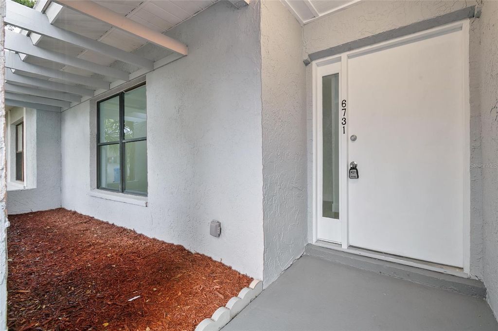 Photo of 6731 Islander Lane, Tampa, FL 33615 (MLS # T3532620)
