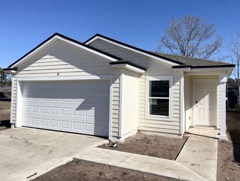 Photo of 34 Flagstick Lane, Bunnell, FL 32110 (MLS # FC315081)