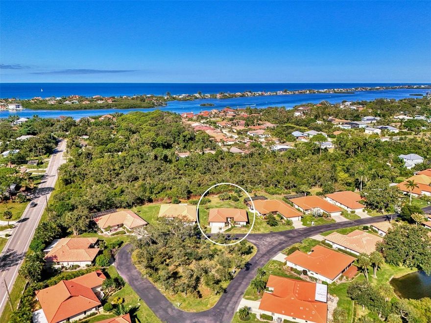 One or more photo(s) has been virtually staged. Laurel Hollow is a sought after Gated Community with gorgeous trees and only 93 homes. This community is ideally located within approx. one mile to Nokomis Beach allowing for a nice walk or bike ride. There is a wonderful clubhouse on the lake with a lovely pool for you to relax and enjoy a swim. This home is situated on a large lot which can easily accommodate a pool. Most of all this home has had many NEW Improvements! A New Roof in 2024, New Hurricane Rated Windows and Slider in 2024, New HVAC system in 2023, New Hot Water Heater in 2024, New Stainless Appliances in 2023, New Enclosed Lanai in 2023 and Newly painted interior in 2025. The livingrm/dining area opens up to the spacious kitchen with granite and stainless appliances. The primary bedrm has a walk-in closet with builtins along with a remodeled bathroom with granite, dual sinks, tiled shower and whirlpool tub. The guest bedroom is situated privately with a remodeled bathroom. There is additional square footage in the newly remodeled Florida room which is perfect for a quiet space for reading or office work. This home is ready to move in with nothing to do! The Community is within walking distance to the Post Office, Publix, The Tiki Bar Restaurant and Starbucks along with so much more! Truly a Special Find for that Winter getaway or making it Home!