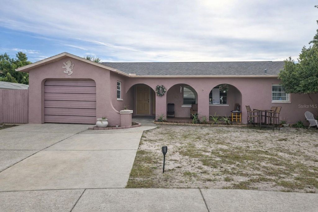 Photo of 10230 Autumnwood Drive, Hudson, FL 34667 (MLS # TB8468056)