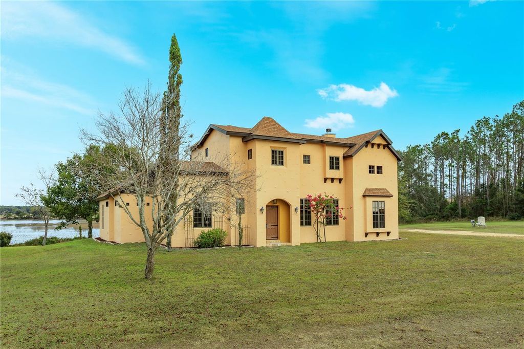 Photo of 24540 Turkey Lake Road, Howey In The Hills, FL 34737 (MLS # G5105259)
