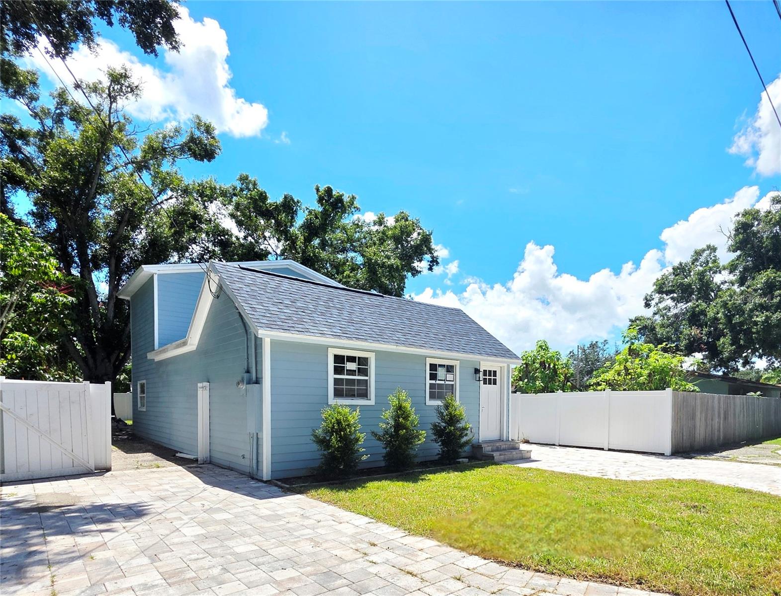 Welcome to your fully updated dream home in the heart of Pinellas Park! This spacious 4-bedroom, 3-bathroom residence has been completely renovated inside and out, offering the perfect blend of style, comfort, and peace of mind. The brand-new kitchen is a true showstopper, featuring all new cabinetry, modern appliances, and a striking waterfall quartz island that makes the perfect centerpiece for both cooking and entertaining. Inside, you’ll also find all-new plumbing, electrical, recessed lighting throughout, and elegant new LVP flooring that flows seamlessly across the home. There are two master suites, one with a private walk-out balcony, and all three bathrooms have been fully remodeled with fresh, modern finishes. The exterior is equally impressive with a brand-new roof, brand new durable Hardie board siding, several new windows, and a newly built balcony. A new double paver driveway provides plenty of parking, while the gated backyard offers secure storage for a boat or RV. The brand-new fence and gates enclose a small, low-maintenance yard perfect for outdoor enjoyment. Additional highlights include new lighting fixtures and hardware throughout, Flood Zone X! Requires NO flood insurance, and proven storm resilience, having withstood two recent hurricanes without damage or flooding. With every major system updated, this turnkey property delivers modern upgrades, functionality, and peace of mind—all just minutes from shopping, dining, schools, and Florida’s world-class beaches.