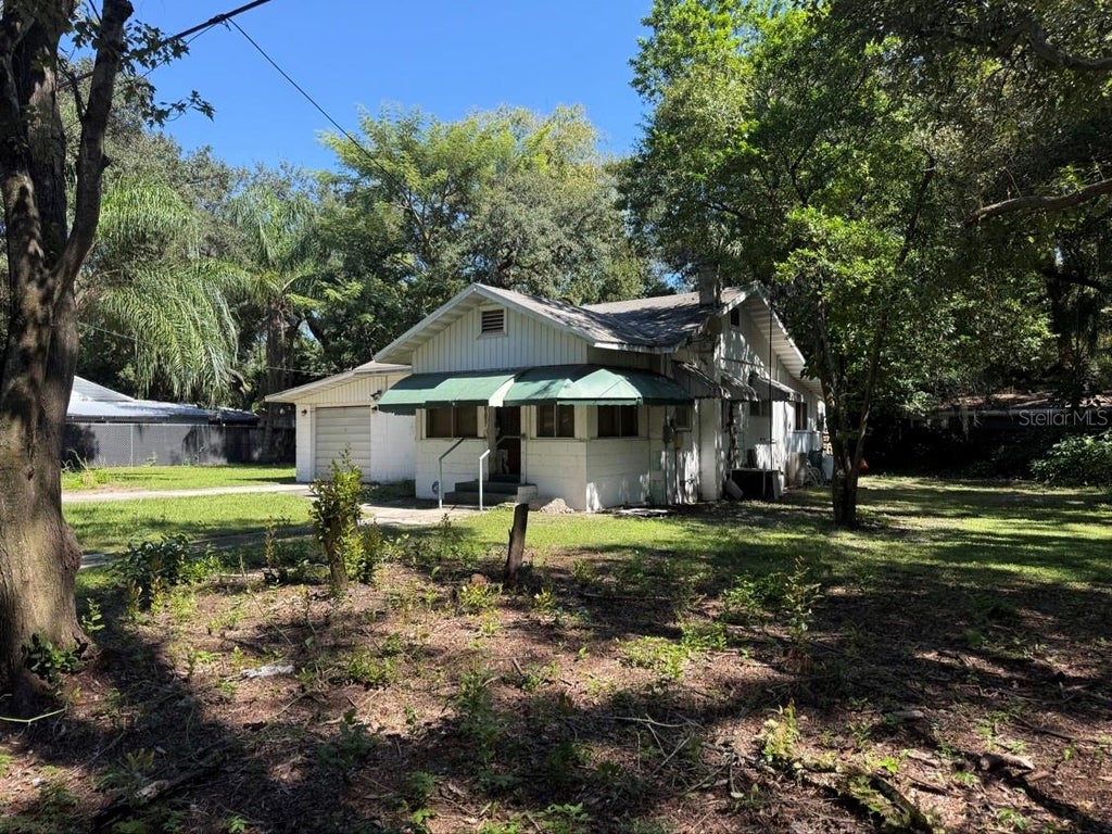 Photo of 10109 N Jasmine Avenue, Tampa, FL 33612 (MLS # TB8558049)