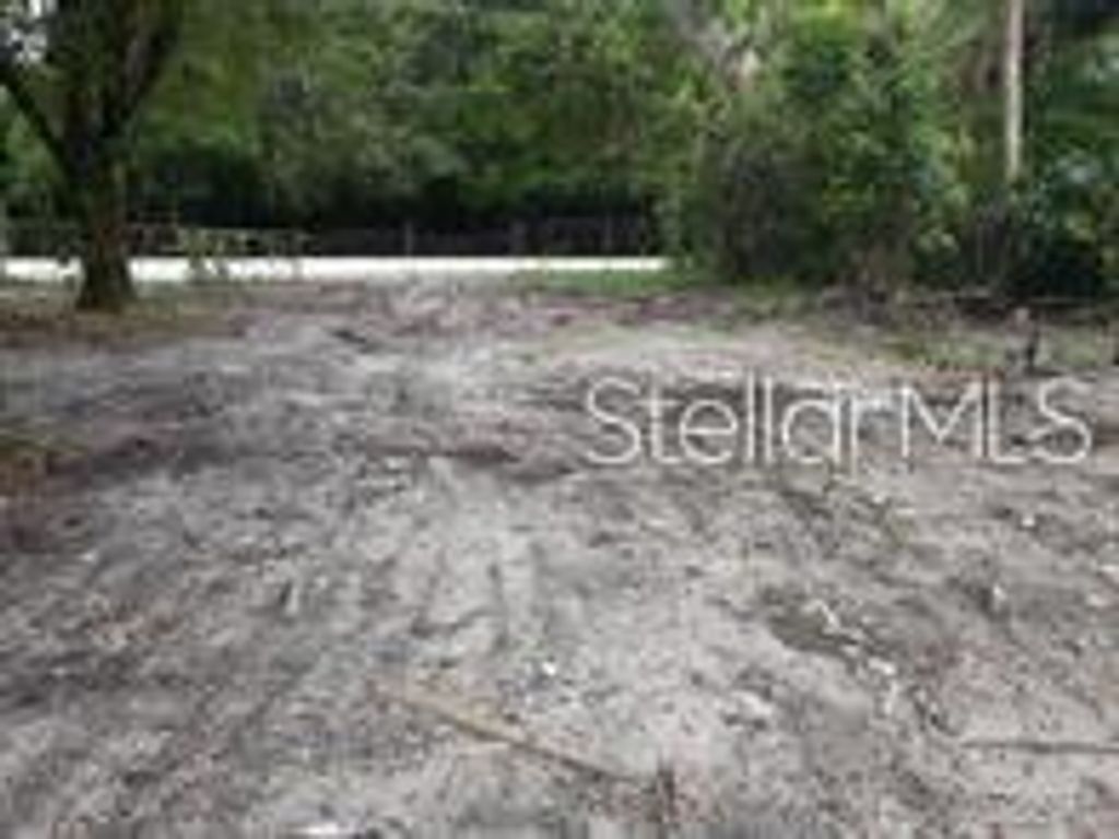Photo of 15940 Lake Magdalene Boulevard, Tampa, FL 33613 (MLS # TB8475226)