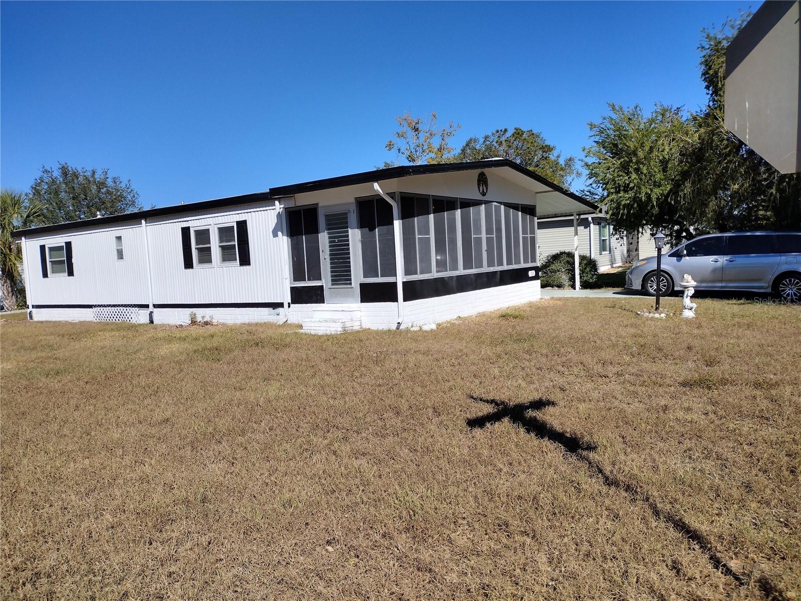 Renovated Walk-in Shower - New wood floor - Renovated Countertop - Pristine Clean - Location at the outskirt of the Village Development and Commercial, Business, Medical facilities on around US 441 / US 27. Residents Villagers enjoy all the amenities offered by the Village Development Golf courses, Recreation Centers, Sport Art Clubs. Organized music art presentations, shows, etc. most of them free of charge. At the same time enjoy the facilities built outside the Village with city class business and commercial without the restriction imposed by the Village management. Just a short golf cart ride away from word-class amenities, including championship and executive golf course, live nightly entertainment 365 days year long. Plus shopping and restaurants, medical facilities along US 441/27. Come and enjoy word class living with unmatched convenience and vibrant community life.