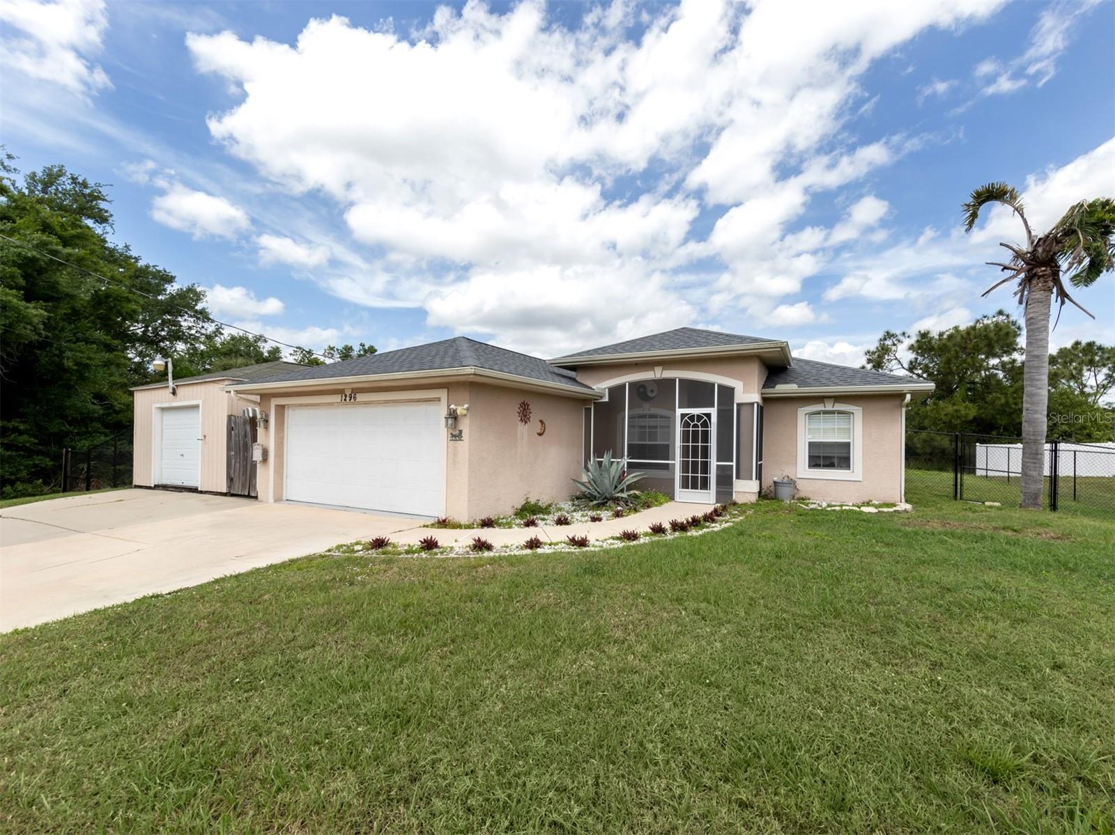 One or more photo(s) has been virtually staged. Welcome to your Florida home in North Port! When you enter the home, you are welcomed by an open floor plan and natural light flowing through plenty of windows to bring the light bright and airy feeling to the home. The split bedroom floorplan offers peace and serenity to family and friends. The master suite has an ensuite bathroom that gives you your own personal oasis after a long day of enjoying the award-winning southwest Florida beaches. This home has a new AC unit (2022), New roof (2022) and stainless steel appliances. North Port is the place to be with shopping, restaurants, major roadways, medical facilities, award winning Florida beaches, and quick access to the up-and-coming community of Wellen Park and CoolToday Park, home to the Atlanta Braves Spring Training. You won’t want to miss out on this opportunity to see this incredible home.