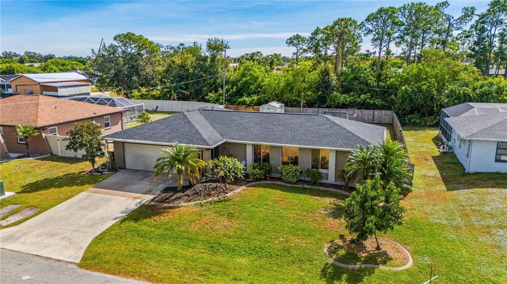 Photo of 947 Silver Springs Terrace NW, Port Charlotte, FL 33948 (MLS # C7517223)