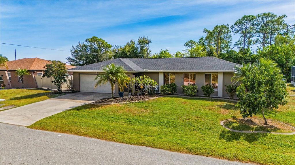 Photo of 947 Silver Springs Terrace NW, Port Charlotte, FL 33948 (MLS # C7517223)