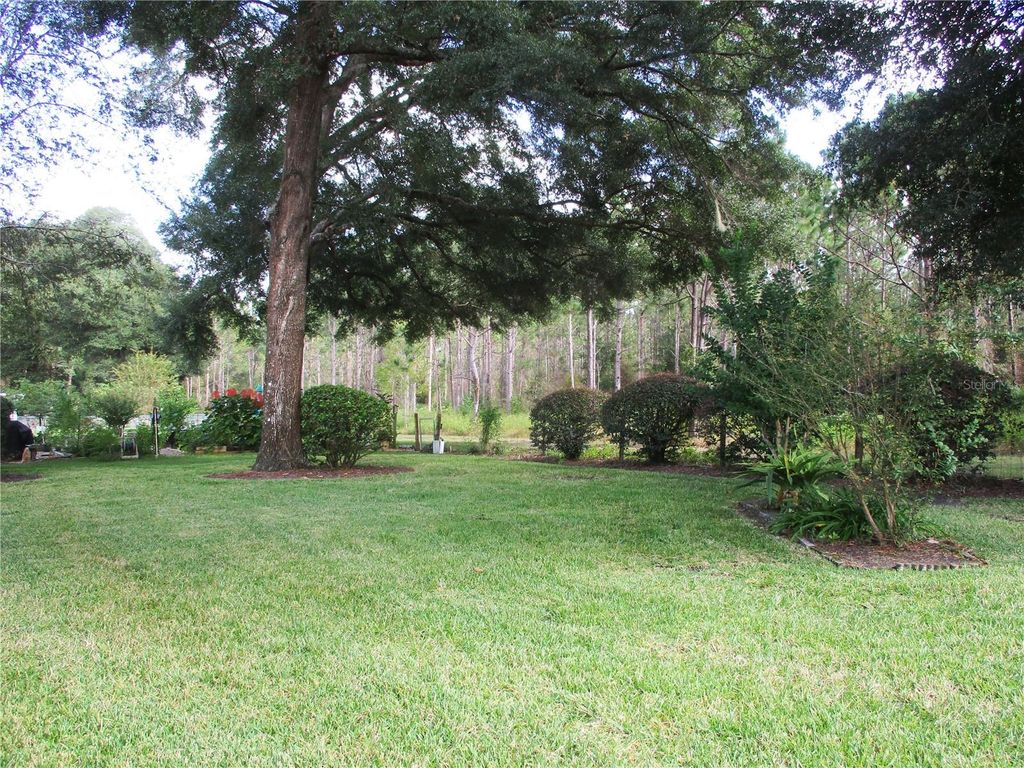 Photo of 14272 SW 112th Circle, Dunnellon, FL 34432 (MLS # OM700762)