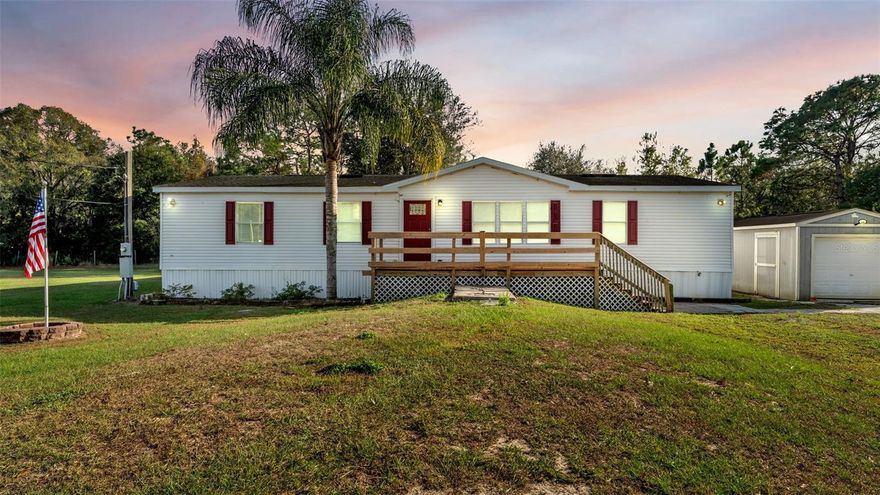 Experience the best of peaceful country living!
This spacious Palm Harbor manufactured home offers 5 bedrooms, 2 bathrooms, a chicken coop, a tree swing, and a fire pit, all nestled on 5.98 beautiful acres.

Step inside to an open kitchen featuring a generous island that any home cook will love. Fridge and Dishwasher are approx 2 years old.  Stainless steel Stove and Microwave approx 7 years old. The primary suite includes a remodeled private bath with a relaxing jetted Jacuzzi tub, separate shower, and dual sinks. Water softener is rented and will be removed prior to closing so the buyer can get their own.

You’ll also enjoy a large utility room, a versatile bonus room, and plenty of space for the whole family. Outside, the property is fully fenced and includes a separately fenced pasture with a drive through gate, a large shed (12 x 32) includes a roll up door with a regular door and window on the side, a smaller shed (10x10) with a roll up door, pole barn, chicken coop, fire pit, and a beautiful tree swing—perfect for weekends full of fun and memories!

This is country living at its finest. Come see this beauty before it’s gone! All measurements are approximate, buyer(s) and buyer's agent to confirm exact room measurements. No sight unseen offers accepted.