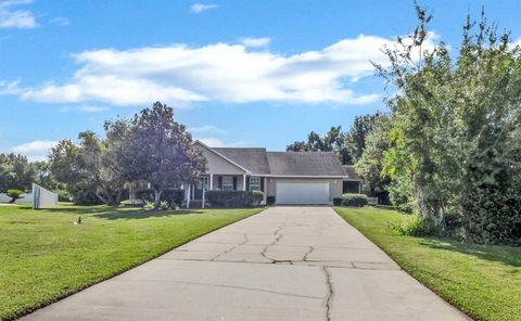 Photo of 1842 W Virginia Drive, Kissimmee, FL 34744 (MLS # O6352827)