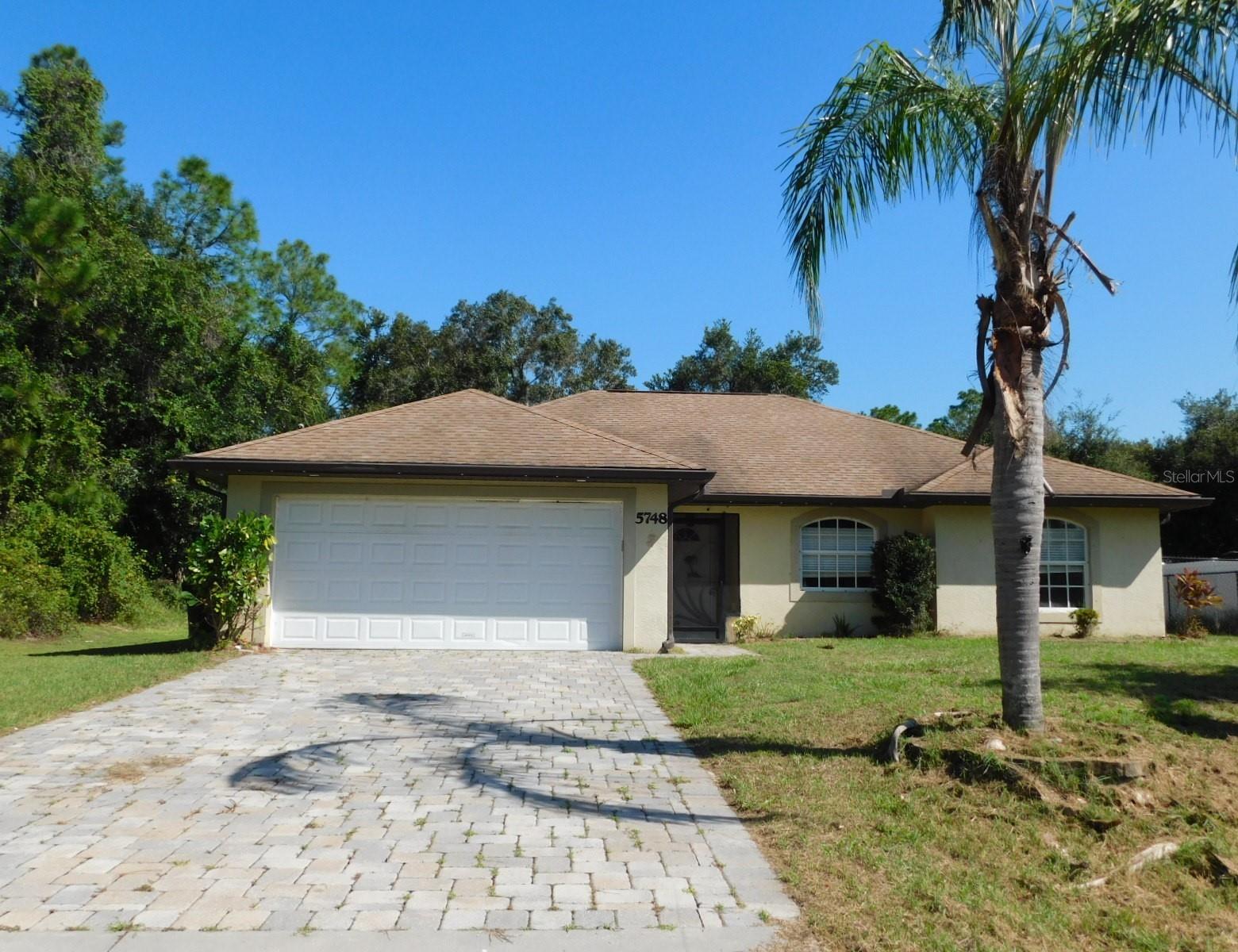 3 bedroom, 2 bath home with split bedroom plan. The living room has french doors leading to the large fenced back yard with utility shed for extra storage. There is a nice paver patio area with an outdoor kitchen. With a little sprucing up this could be a wonderful home to enjoy for many years to come! Buyer is advised to have complete and thorough inspections done and to verify all information. Seller/Agents have no knowledge of property conditions. Being Sold As-Is.