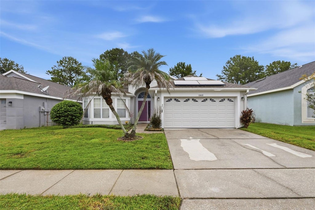Photo of 13637 Emeraldview Drive, Orlando, FL 32828 (MLS # O6438889)