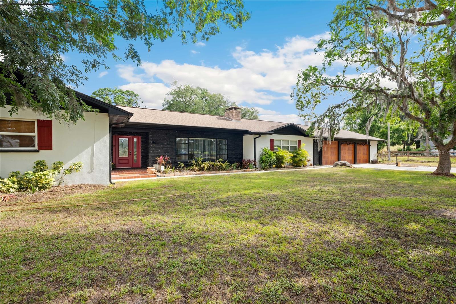 Welcome to your private country retreat! This beautifully maintained 4-bedroom, 2.5-bath ranch-style home with a pool that is nestled on 10 scenic acres, could be the perfect opportunity for multigenerational living, offering the perfect blend of comfort, space, and versatility. The open-concept living and dining areas are ideal for entertaining, while the kitchen features modern appliances, ample storage, and a cozy breakfast nook. The primary suite includes a private bath and generous closet space, complemented by three additional bedrooms for family or guests.Step outside to enjoy wide open spaces, mature trees, and peaceful views. The property also includes a large barn with a fully equipped studio apartment above—ideal for guests, rental income, or a private workspace.
Highlights:
*95 X 25 Concrete block shop that has two 2 car garage bays with garage doors. Currently plumbed for 2 1/2 baths, kitchen, and laundry room. Has its own electrical panel with 220Vs and water heater. Its own septic tank and drain field.
*40 X 49 Barn with poured concrete slab floor and large roll up door. With its own electrical panel and 220Vs and is own septic tank and drain field.
*Water lines run from one end of the property to the other end.
*Unfinished full bathroom in the 3 car garage of the house, that could be used as a pool bath.
*Three RV hooks up for power, water and ability to empty RV gray water tanks into the septic tank of the Barn.
*Bring your horses, cowes and pets, property is cross fenced.
*Primary bath has its own tankless water heater.
Whether you’re seeking a hobby farm, a home-based business setup, or simply a tranquil lifestyle, this property offers endless possibilities. Don’t miss this rare opportunity to own a slice of country paradise—schedule your showing today!