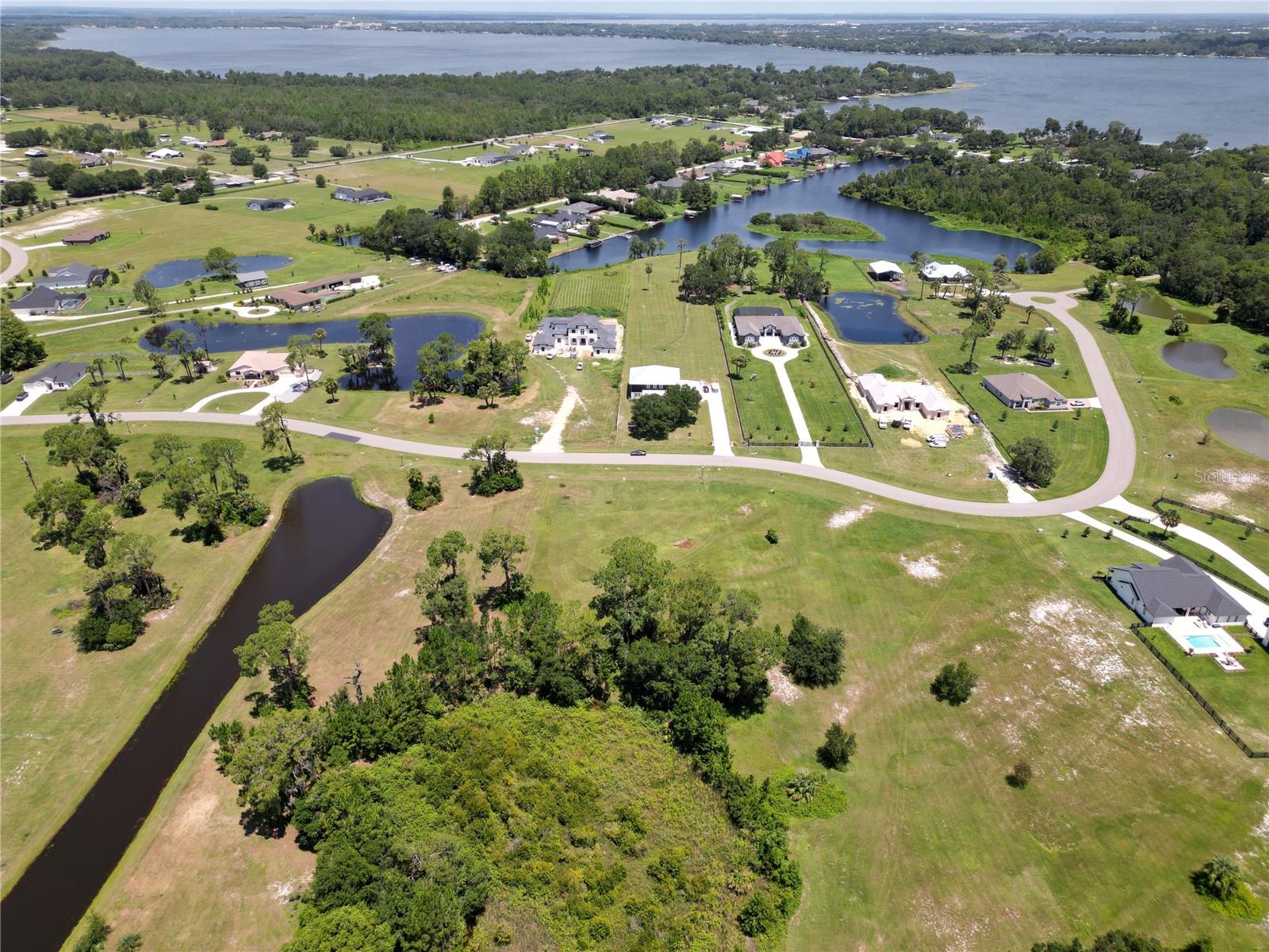 Hidden River Lakes is a 232 acre waterfront community that provides all homeowners with access to the Harris Chain of Lakes. This is your opportunity to build your dream home on 2.67 acres, within a beautiful gated community. No time frame to build. Bring your own builder. This property is zoned equestrian, you can stable and have up to 2 horses on your lot. You can have your boat and RV stored on your lot. Community Boat Ramp. City water and City Sewer. Low HOA with owner Board. Great location for access to Historic Mt Dora, Tavares, Eustis and Leesburg. Under an hour to International Airport. Under an hour to all of Central Florida's main attractions. This is a truly special location for someone dreaming of living the Lake Life in Central Florida!