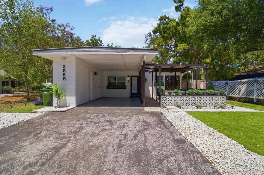 Step into this beautifully updated 2-bedroom, 2-bath home, where comfort meets style inside and out. From the moment you arrive, the peaceful setting at the end of a quiet cul-de-sac invites you to slow down and enjoy the space.

Inside, you’ll find a thoughtfully remodeled interior featuring modern laminate flooring, updated windows, and a bright, open layout. The kitchen is designed for both everyday living and entertaining, complete with solid wood cabinetry, granite countertops, brand-new appliances, and a spacious island perfect for casual dining or gathering with guests.

The primary suite offers a true retreat with generous space, a walk-in closet, and a stunningly renovated bathroom showcasing designer tile, a walk-in shower, dual vanities, and granite finishes. A unique touch—direct access from the bathroom to the backyard—creates a seamless indoor-outdoor experience.

Out back, your private oasis awaits. Enjoy a lush, shaded yard with new fencing, a gazebo, covered patio, and outdoor kitchen—ideal for relaxing evenings or hosting friends and family.

Additional highlights include a durable metal roof, newer A/C, indoor laundry, and a covered carport with extra storage. The front patio, finished with slate tile and a pergola, adds even more charm and functionality.

Perfectly located just minutes from Payne Park, downtown Sarasota, Siesta Key, and I-75, this home offers the best of both convenience and tranquility.