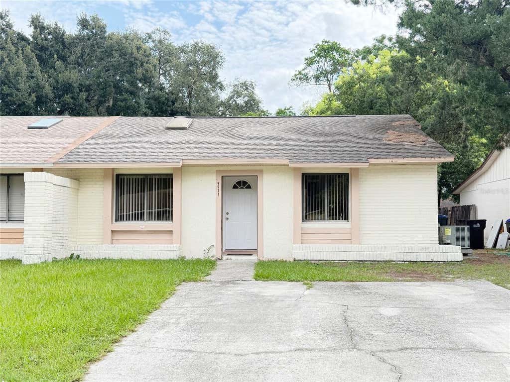 Photo of 9911 Burl Way, Orlando, FL 32817 (MLS # O6431994)