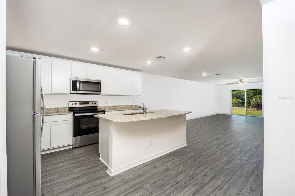 Photo of 3171 Seville Street, Lake Alfred, FL 33850 (MLS # TB8459789)