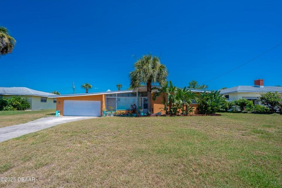 Beachside Charm - Steps from the Ocean! Live the dream, ride the wave in this beautifully maintained 3-bedroom, 2-bath concrete block home, ideally located just a few blocks from the ocean in the heart of Ormond Beach. Nestled between the Atlantic Ocean and the Intracoastal Waterway, this beachside retreat offers the perfect blend of coastal tranquility and everyday convenience. Enjoy peace of mind with a 2018 A/C, no flood zone, and no HOA. The spacious lot features a fully fenced backyard with a storage shed and has plenty of room for a pool. The large covered back porch is perfect for relaxing or entertaining. The split-bedroom floor plan offers privacy, while the spacious 2-car garage provides ample storage. Just minutes from grocery stores, medical facilities, dining, and attractions, this home is your gateway to the laid-back Florida lifestyle. Whether you're searching for a primary residence, vacation home, or investment, this property checks all the boxes....
Don't miss this opportunity to own a slice of paradise in one of Ormond Beach's most sought-after neighborhoods. Schedule your private showing today!
(All information recorded in the MLS is intended to be accurate but cannot be guaranteed.)