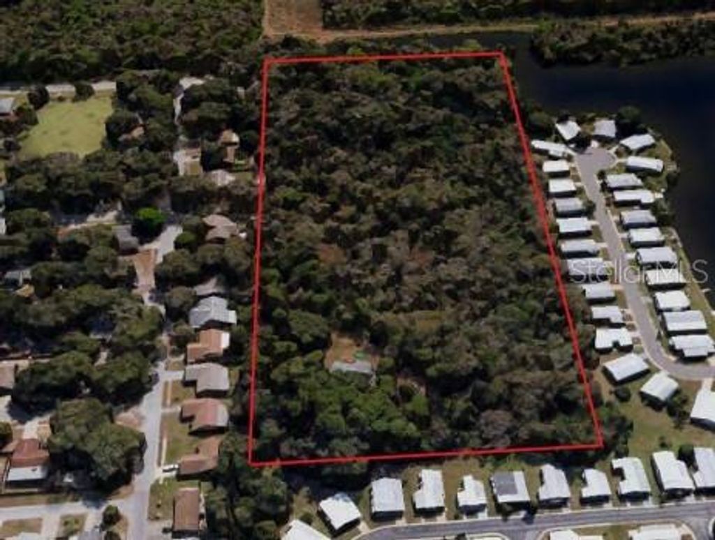 Photo of 5001 Whippoorwill Drive, Holiday, FL 34690 (MLS # W7884728)