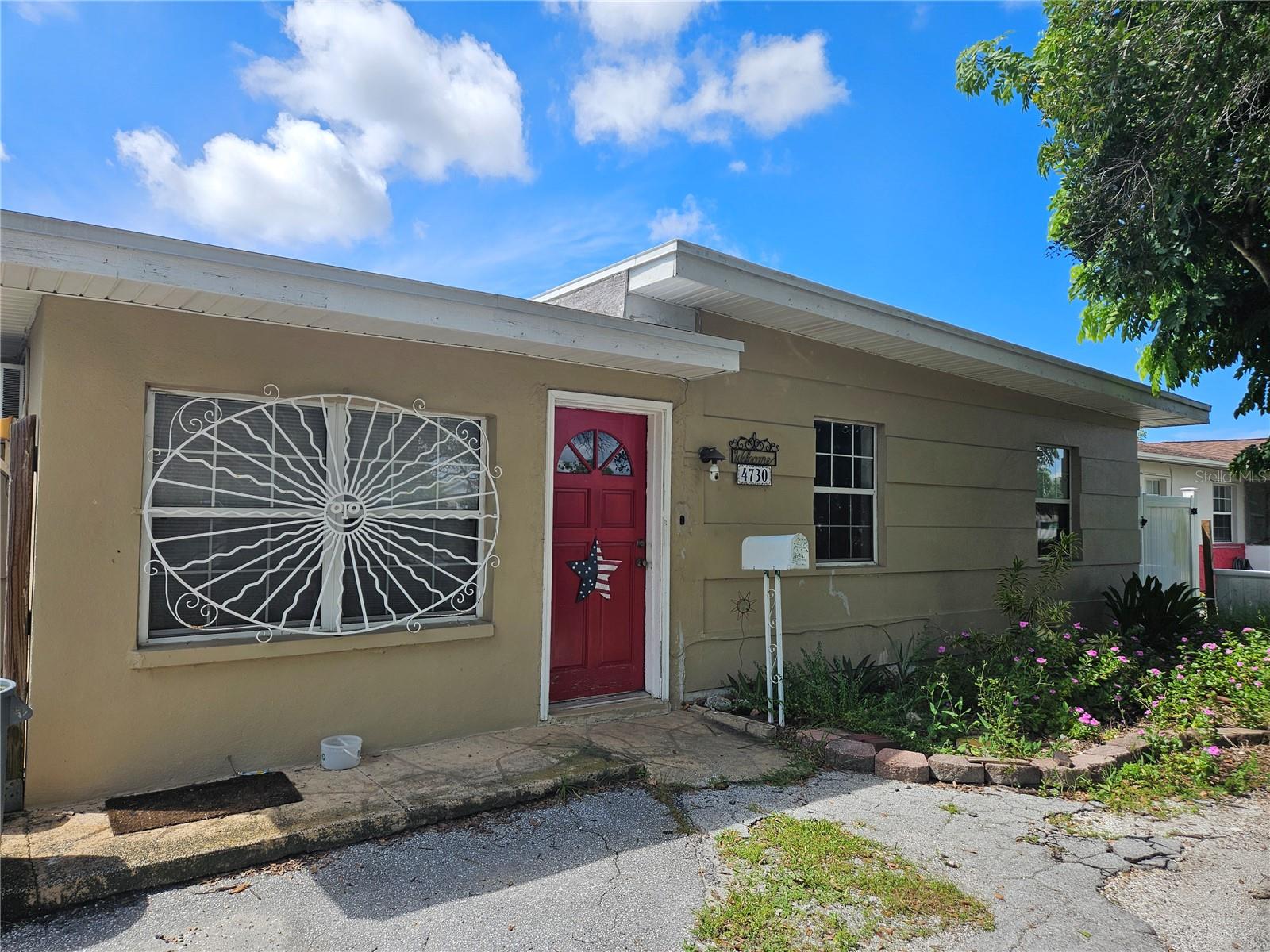 Opportunity knocks!!! This spacious St Pete home is ready for you to make your own! The home does need updates and some repairs but there are so many extras: 3 bedroom with a den, working wood burning fireplace, 2 full baths, spacious family room, inside laundry, large pantry, screened back porch, fully fenced backyard complete with above ground pool (2 years old), koi pond, garden and gazebo. There is even an 18 ft (2022) travel trailer (value over 20K and in excellent condition)and generator that can possibly stay! There is alley access too! The location is great! Close to downtown, shopping, restaurants, parks and all that St Pete offers! The home is block construction! Located 52 ft above sea level with an X flood zone! Storage shed! This could be a wonderful home for the handy person or investor! Lots of sq ft and endless possibilities! Dont miss this diamond in the rough! It can shine and have instant equity too! Value and location! A winning combination!