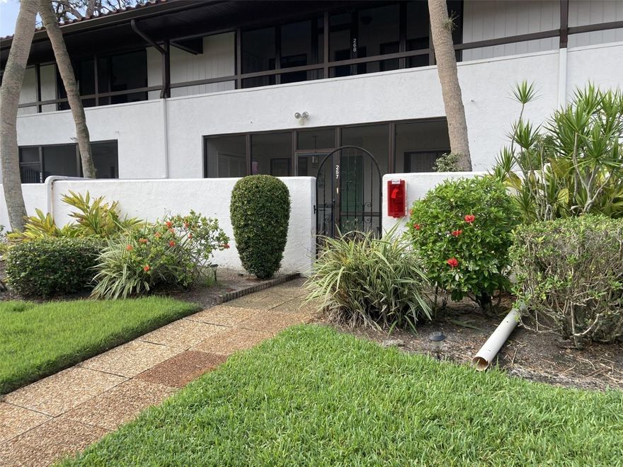 This is a very nice first floor turnkey furnished condo in Valencia Gardens located in the IMG Country Club area.  As you enter there is a front courtyard and a front screened porch.  The front porch has a closet which houses the washer and dryer plus a storage closet. The condo has a very open floor plan with kitchen open to the dining and living area.  Each bedroom has it's own bathroom with sliding doors opening to a porch. The rear lanai is screened and glass enclosed overlooking a large patio and a greenbelt area.  From the rear lanai is a short distance to the heated pool and spa. There is a carport and guest parking. The country club is semi-private with an 18 hole regulation size golf course plus a grill room and dining room, which has views of Sarasota Bay,  open to the public.  This property is for sale so tenants need to allow it to be show with 24 notice. Approximately 8 miles to the beach, close to shopping and restaurants and about 20 minutes to Sarasota.