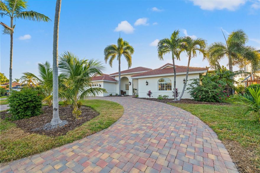 VENETIAN ISLES OPEN WATER OASIS! Experience the ultimate Florida living with unobstructed views of Tampa Bay and the ever-changing waterscape! From the paver semicircular driveway to the BRAND-NEW TILE ROOF 10/2023 and hand rolled NEW EXTERIOR PAINT 11/2023, to the PROFESSIONAL HOTEL GRADE DOCK and BOAT LIFT 2022, this home has it all! The double arched portico and Custom leaded glass French doors entice you toward the breathtaking views of Tampa Bay. Leave the world behind as you enter this oasis of water and light! The coastal design of this home encourages relaxation and entertainment as you enter the open concept living space, tastefully designed to showcase the Florida lifestyle and breathtaking beauty of Tampa Bay! Enter the expansive kitchen with center island, stainless appliances Bosch dishwasher, Samsung Triple French door fridge, Double wall ovens, and GAS cooktop. Watch the morning light dance on the wrap around breakfast bar each morning, reflected by the custom light fixtures, as you sip your morning coffee. Spacious Granite counters and rough-hewn shiplap complete this Chef’s dream kitchen. The formal dining space accommodates both intimate dinners with friends and large family celebrations. Accented by a built-in dry bar with granite counter and extra storage. Delight in the open water vistas at each turn. The home office, Everyone will envy, boasts ample space, boundless water views and private patio access through an impact rated French door. The home’s split floor plan has three spacious bedrooms and two full baths on the south side of the home.
To the north is the main suite complete with private hallway. Wake from a restful night’s sleep listening to the quiet surf to endless water views in the generous main bedroom. Private impact sliders lead to the paver patio and pool for a morning dip or star gazing at night. Step out the impact rated French doors to the paver deck, pool, and ULTIMATE BOATERS DOCK! Imagine your own 16,000 lb. dual motor high speed lift. AND a jet ski “swinger” lift that allows the jet ski to relocate to the dock deck for easy maintenance. The NEW COMPOSITE DOCK &amp; PILINGS 2022 has power, water, light tower, dusk to dawn lighting, boat shore power outlets, and two hose bibs on the dock! This is coastal Florida living at its best! Jump in the pool after a day fishing, boating, or cruising to downtown St Pete for lunch. Pool pump and filter replaced 2022. A laundry room with extra storage and an oversized two car garage complete this amazing home. Convenient and easy access to Tampa International Airport, just 25-min drive. Downtown St. Petersburg, a mere 4-mile bike or golf cart ride, partake in the vibrant tapestry of the Saturday morning market, explore award winning restaurants, boutique shopping, world-renowned art galleries including the Dali Museum, the Pier, Yacht Clubs, Morian Art Center, and private airport for your convenience. A+ schools Canterbury and Shorecrest, &amp; World-famous Beaches just moments away. All your grocery needs are easy to find with Fresh Market, Trader Joes, Rolling Oats, Publix, and a new Whole Foods.