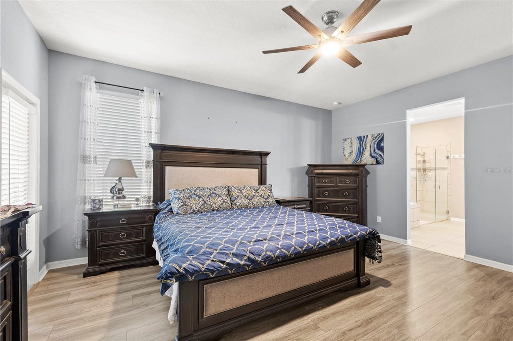 Photo of 12015 Stone Bark Trail, Orlando, FL 32824 (MLS # O6421438)