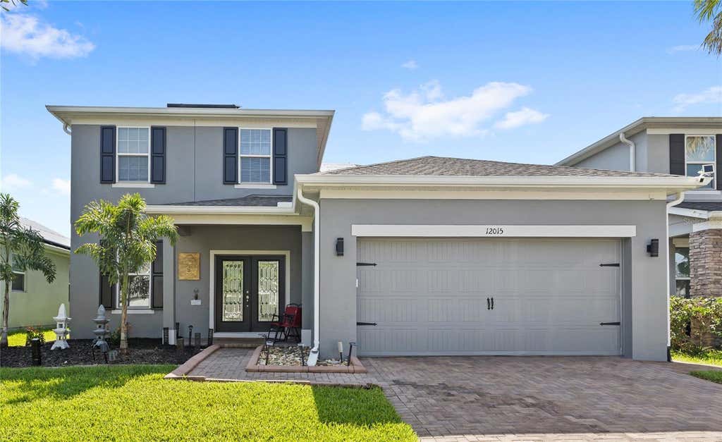 Photo of 12015 Stone Bark Trail, Orlando, FL 32824 (MLS # O6421438)