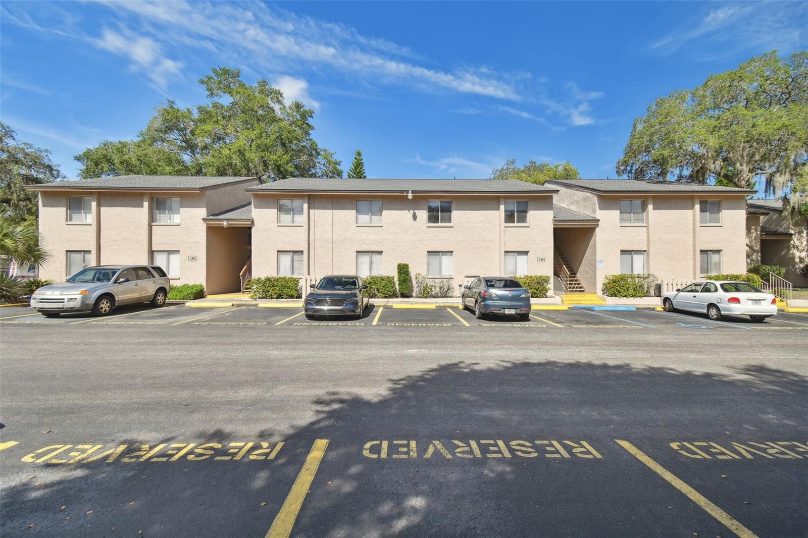 Seize the opportunity NOW to own this move-in-ready condo that checks every box! Perfectly priced and nestled in an unbeatable location, this stunning unit is your ticket to low-maintenance living near the heart of Tampa’s vibrant scene. Step into a gorgeous galley kitchen that will inspire your inner chef, featuring gleaming granite countertops, stainless steel appliances, and sleek soft-close cabinetry. The spacious main living area flows effortlessly, offering serene, landscaped views that create a tranquil backdrop for relaxation or entertaining. The primary bedroom is complete with a massive walk-in closet to satisfy your storage needs. The primary bathroom is complete with a tub/shower combo and a vanity in its own space. A second bedroom provides versatile space for guests, or an office, and is steps away from the second FULL bathroom. Convenience is key with an in-unit laundry room, making laundry chores a breeze. Step outside to enjoy not one, but two resort-style pools—one just steps from your door and another a short stroll away, paired with access to the vibrant community clubhouse. Location? Unrivaled! You’re near grocery stores, trendy restaurants, cozy coffee shops, Tampa International Airport, the University of South Florida, Busch Gardens, and the iconic Tampa Riverwalk, where urban energy meets waterfront charm. Priced to sell and brimming with upgrades, this condo is a find in today’s market. Schedule your showing NOW and start living the Tampa lifestyle you’ve always wanted!