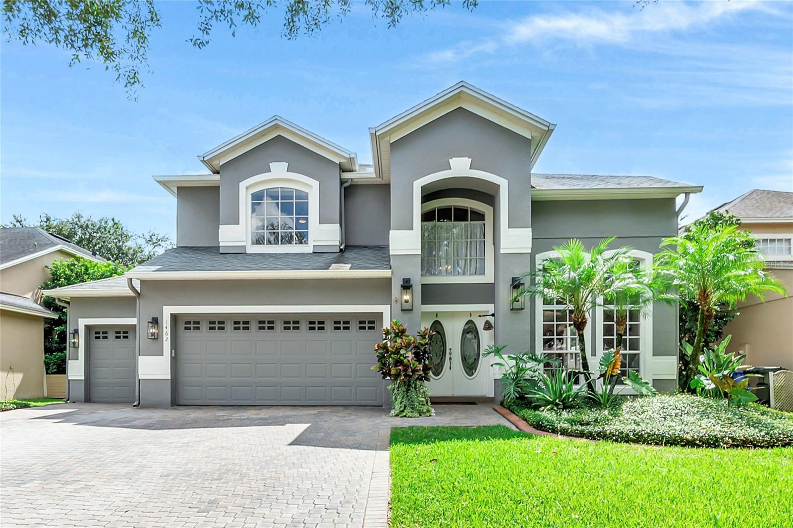 Updated, spacious and located in Oviedo’s sought-after Live Oak Reserve, this attractive pool home is so easy to love! From its inviting entrance to its big, contemporary kitchen and enchanting lagoon style pool and spa, you’ll love it’s style and character. Approach along a pretty, brick paver walkway, and you’ll find yourself entering into an open, impressive living space enhanced by floor to ceiling windows, volume ceilings and handsome wood plank flooring. Continue through to an updated kitchen with rows of 42’ cabinets, abundant granite counter space, and a large island, perfect for quick meals, entertaining, or to share a drink with company while cooking. Together with a comfortable family room, and transitioning to a fabulous screen enclosure with upgraded salt-water pool, heated spa, and expansive covered deck, you’re guaranteed to enjoy this living space year-round. For a home office, den, or overnight guests, there’s a bedroom downstairs. And upstairs, a private, spacious owners’ suite indulges you with a handsomely remodeled bathroom and attractive walk-in shower. Secondary bedrooms are generously sized, and everyone will love this Bonus Room, complete with a convenient closet — set up a hobby spot, study room, gaming place, or work-out studio. Improvements you’ll appreciate include a 2022 refrigerator, dishwasher, and hot water heater. The AC was replaced in 2022 and new enclosure screens added in 2024. Don’t forget the 3-car garage you’ve always wanted and additional storage space under the stairs. In popular Live Oak Reserve, featuring resort-style resident amenities, tree-lined streets and natural conservation areas. Near UCF, major employers, restaurants, shopping & easy access to the airports & beaches. Served by highly desirable, A-Rated schools! Come see this exceptional home and make it yours today.