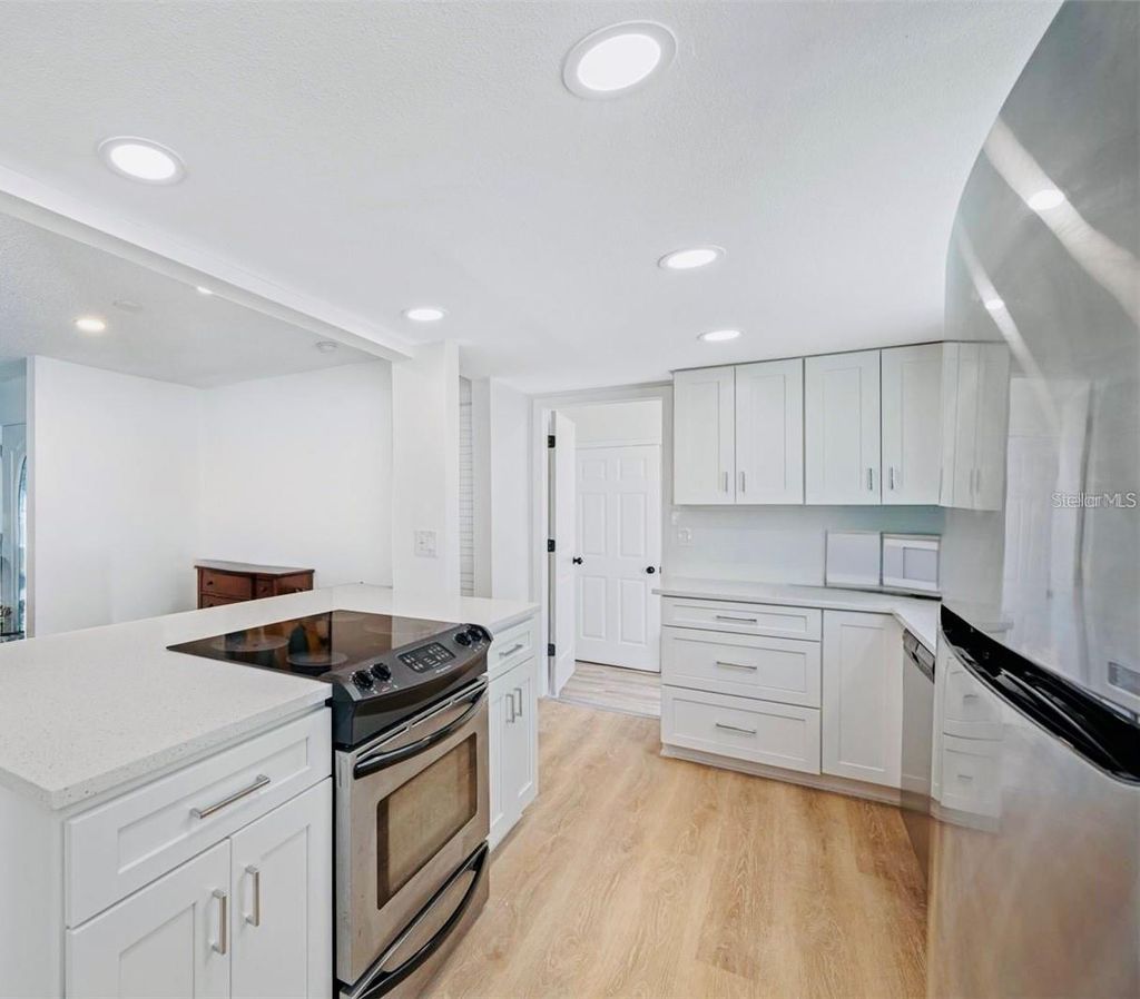 Photo of 1902 Briarwood Street, Dunedin, FL 34698 (MLS # TB8445412)