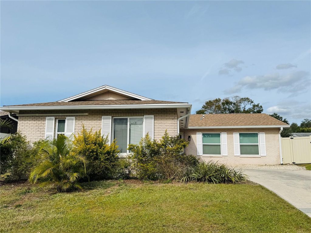 Photo of 1902 Briarwood Street, Dunedin, FL 34698 (MLS # TB8445412)