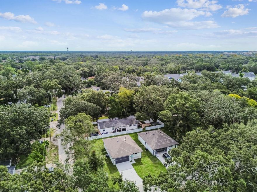 New Construction – Custom Contemporary 3-Bedroom, 2-Bath Home conveniently located just minutes from main freeways I-257, I-75 and I-4. Experience modern living at its finest in this gorgeous custom-built home, perfectly situated in a tranquil location with convenient access to all New Tampa, Wesley Chapel, Lutz, Carroolwood. Just minutes from Busch Gardens, Adventure Island, the University of South Florida, the VA Hospital, dining, shopping, entertainment, and more! Enjoy the elegance of a chef’s kitchen featuring quartz countertops, an and a generous walk-in pantry. The open concept design also includes high-end waterproof luxury vinyl flooring, impact windows for added safety, and insulated block walls with upgraded attic insulation for optimal energy efficiency. This is a rare opportunity to own a custom-built home in a prime Tampa location. Not in a Flood Zone!