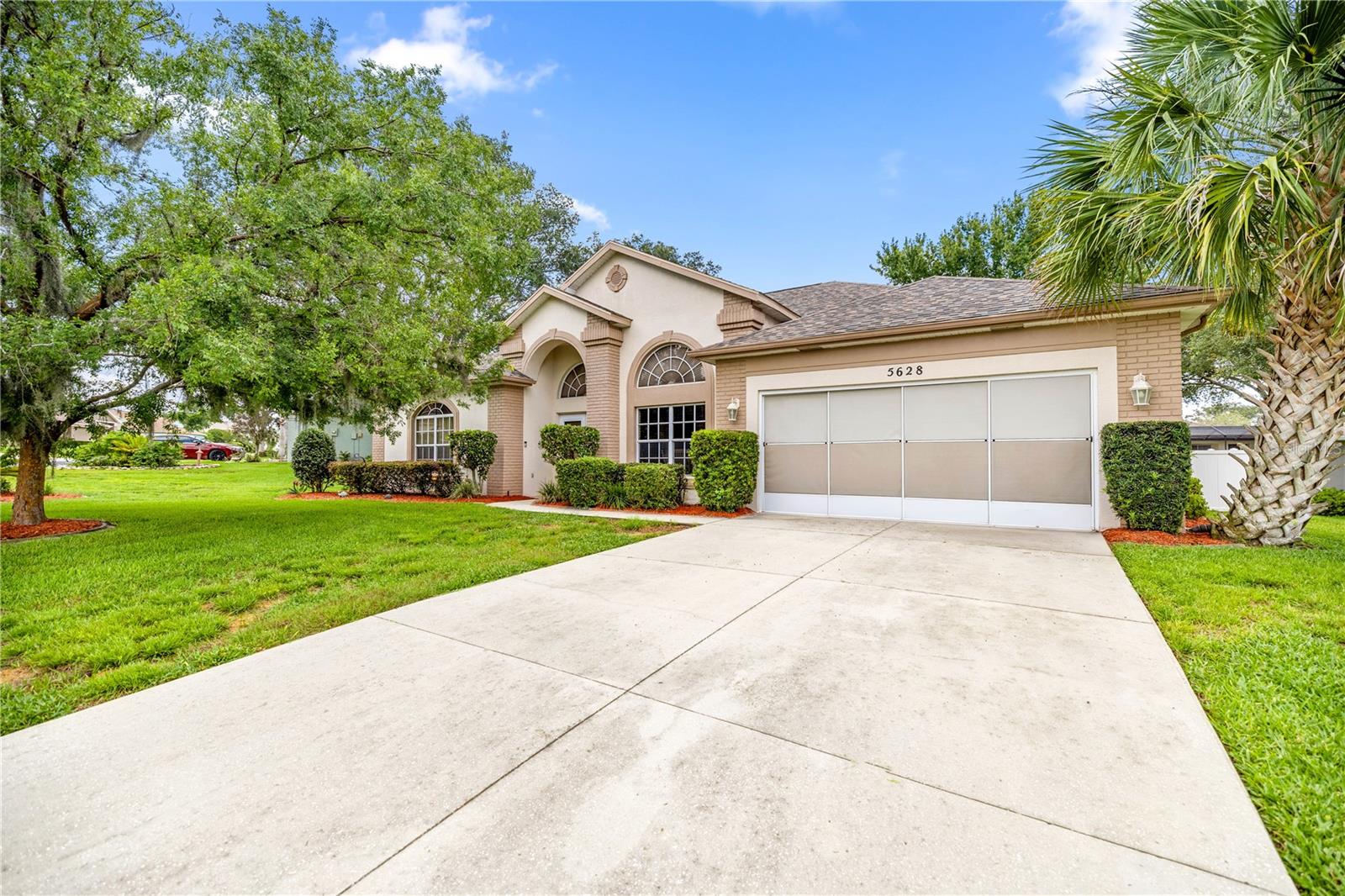 Welcome Home to this amazing Pool Home in Citrus County. Located in Crystal Oaks, a gated community for all ages with low HOA in Lecanto. Convenient access to the Suncoast Parkway just a mile away makes an easy commute to the Tampa area. This well designed 4 bedroom, 2 full bath concrete block home offers 2,555 of comfortable living square feet. The open floor plan welcomes into a living and dining room with high ceilings and a front office or 4th bedroom with French doors. Any chef will enjoy cooking in this eat in kitchen with island and bar countertop opens to a large family room. The split bedrooms and multiple living areas offers privacy and ideal design for multi generation living. The primary suite is a relaxing retreat with his and her walk in closets, spa like ensuite has double vanity, whirlpool tub and separate shower. Main focus is on the Pool with total of 5 doors opening to the large lanai area including a pool bath, perfect for indoor / outdoor entertaining. The birdcage has privacy screening and new epoxy flooring on patio. The mature landscaping includes palm trees as well as a large Magnolia tree. Recent updates giving peace of mind include: New Roof 2021, HVAC 2020, 50 gal Water Heater 2023 and New high quality carpet and pad with hardwood floors remaining underneath throughout house. Furnishings are available and negotiable. New Roof 2021, HVAC 2020, 50 gal Water Heater 2023, Whole house plus pool Surge Protection 2023 and New high quality carpet and pad with hardwood floors remaining underneath throughout house. Zoned for Rock Crusher Elementary, Crystal River Middle and Crystal River High School. Great location close to all amenities including shopping, restaurants and miles of beautiful paved bike trails. Motivated Seller, wanting to be closer to grandkids. We look forward to sharing everything this amazing property has to offer. Give us a call for your private showing today.