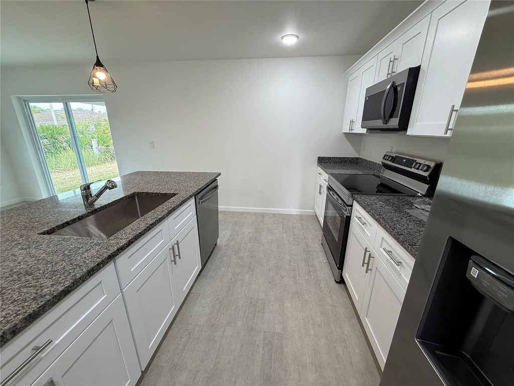 Photo of 2164 Northland Avenue, North Port, FL 34288 (MLS # A4671245)