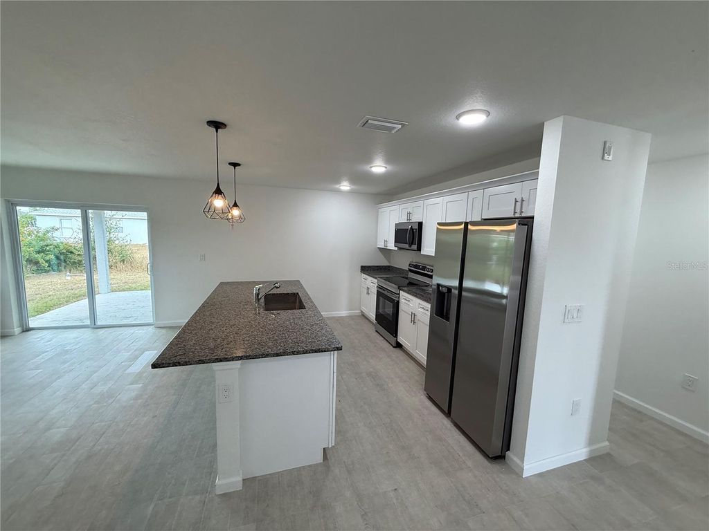 Photo of 2164 Northland Avenue, North Port, FL 34288 (MLS # A4671245)