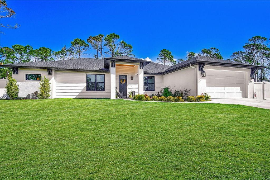 Photo of 12078 Chapman Ave, Port Charlotte, FL 33953 (MLS # N6143362)